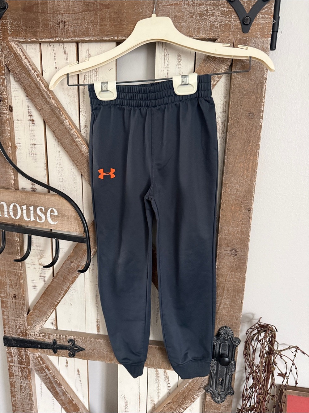 Under Armour Boys Black Joggers with Orange Logo